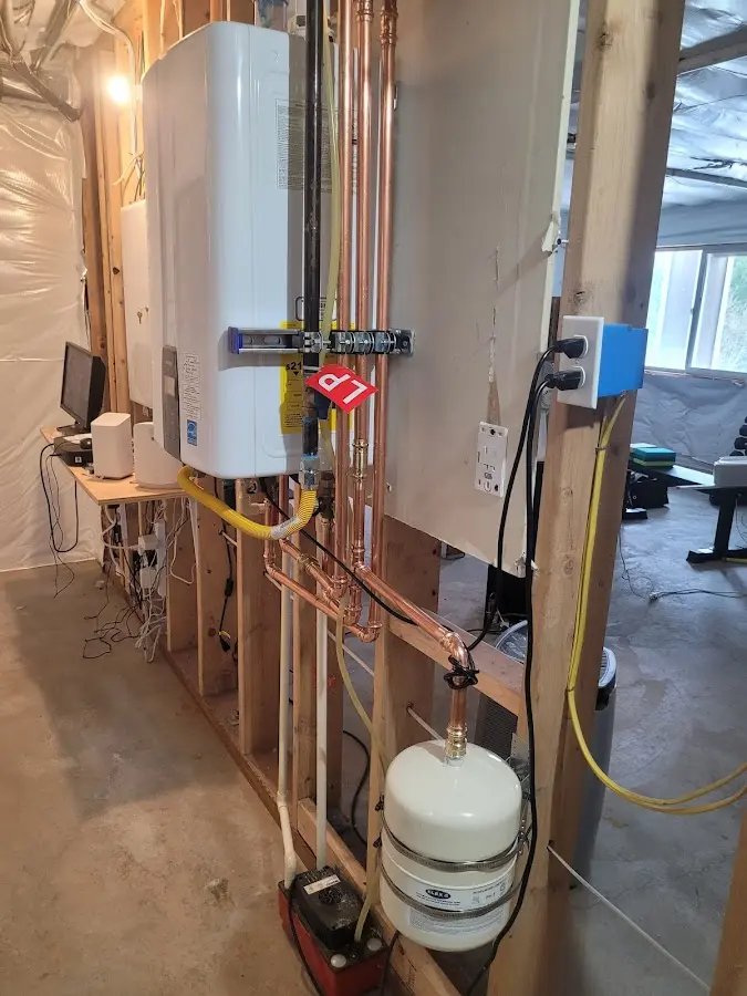 Licensed plumber repairing a kitchen sink in Elkhart